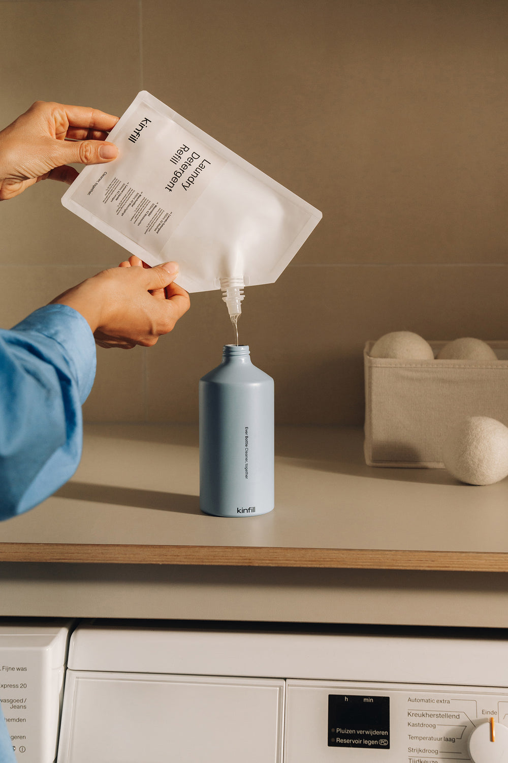 Fill the bottle with the pouch
