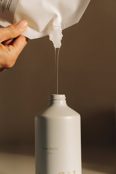 Fill the bottle with the pouch